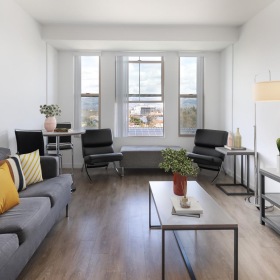 a living room with large windows
